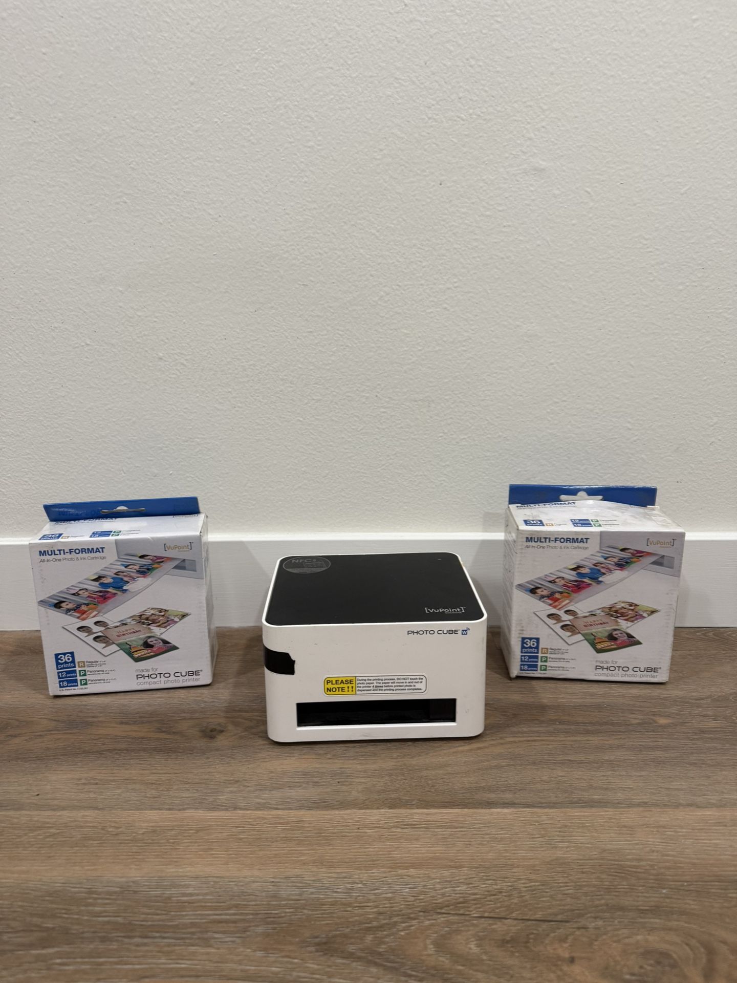 VuPoint Photo Cube Printer and 2 boxes of photo printer
