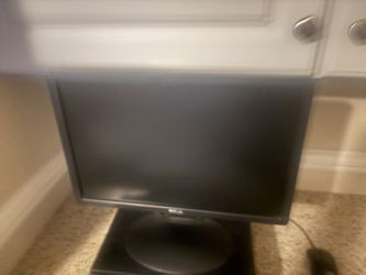 dell computer monitor and hard drive and mouse