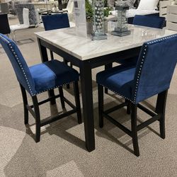 Table and four, stools, 599