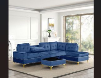 Features :  Contemporary Stationary Sectional  Available in Black/Gold & Royal Blue/Gold  Nailhead trims  Drop Down cup holder  Storage ottoman is inc