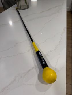 SKLZ golf warm up club