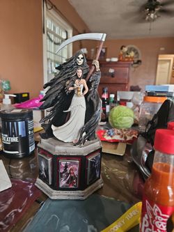 Anne stokes zippo statue