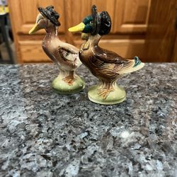 Vintage Ceramic Mallard Ducks Wearing Bonnets Salt & Pepper Shakers.  Size approximately 4 inches tall.  Cork Stoppers.  Preowned.  