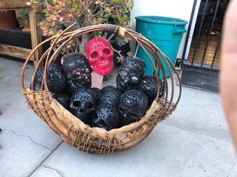 Weaved basket made in Philippines full of plastic Skull heads