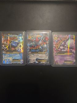 Mega Blastoise EX, Scizor EX, and Mewtwo EX