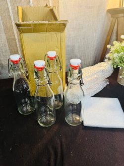 Glass clear bottles. 16oz. 4 pack! Brand new in box!