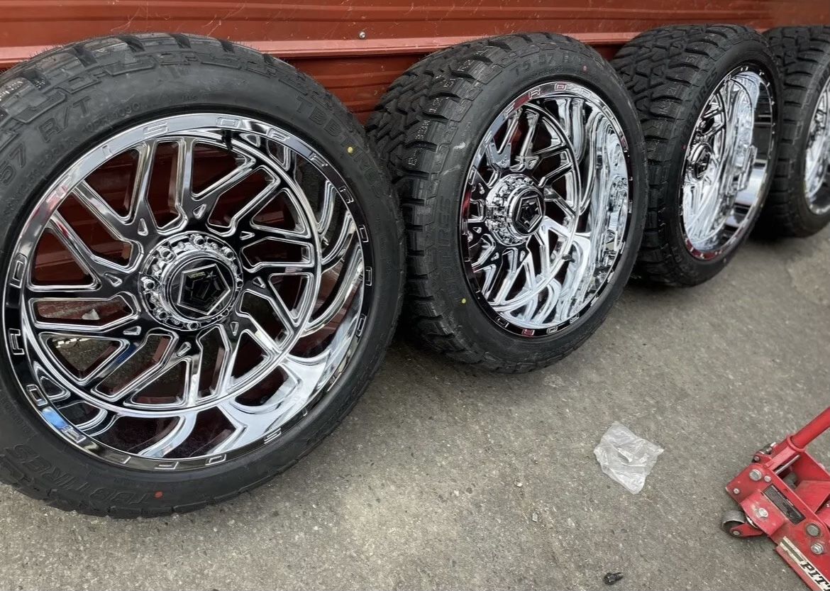 TIS 544C Rim 22X12 6X135/6X139.7 Offset -44 Chrome (Quantity of 4) + 33x12.50x22-We Finance