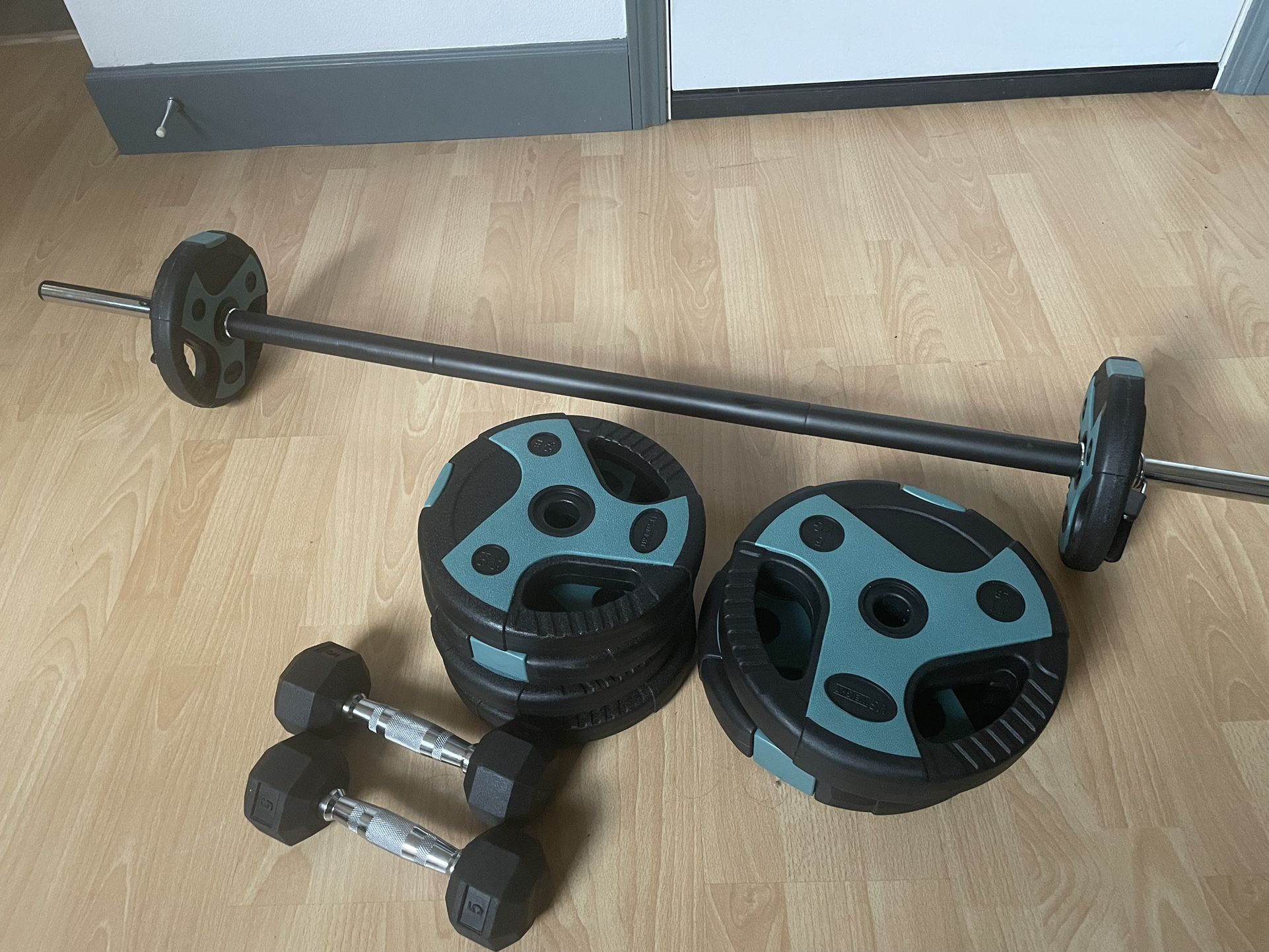 Weight Set 54lb And 2- 5lbs Dumbbells ignite 