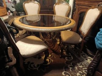 Elegant Dinette set w/4 Articulate chairs