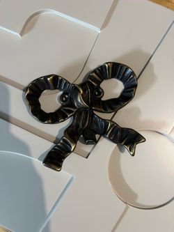 Decorative metal bow