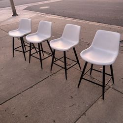 Brand New 4 Beautiful Leather Bar Stools For $120