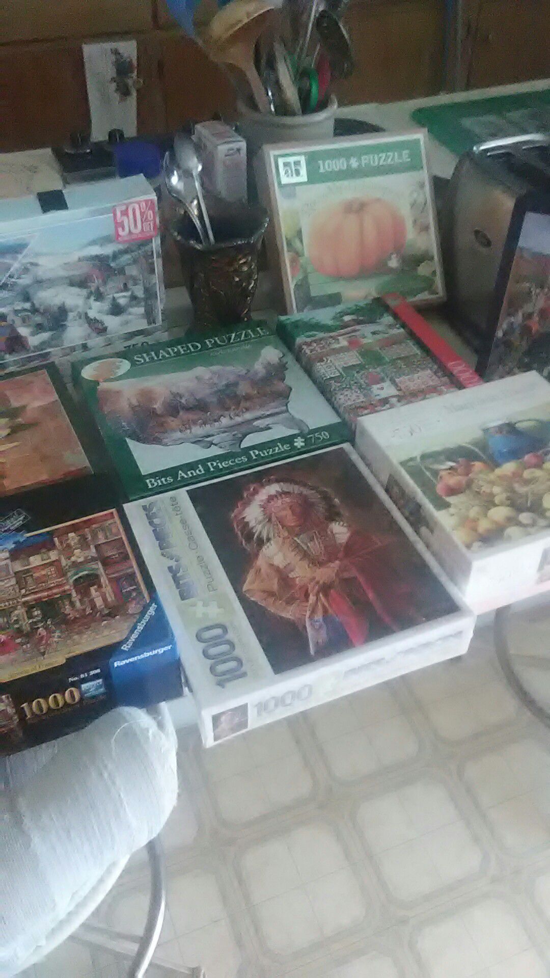 12 PUZZLES.. A FEW NEVER BEEN OPEN