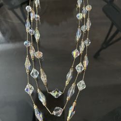Hollywood Regency VENDOME Aurora Bolaiss Crystal Triple Strand Necklace with Their "fleur de lis" Charm.