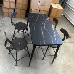 Metal table with 4 metal chairs
