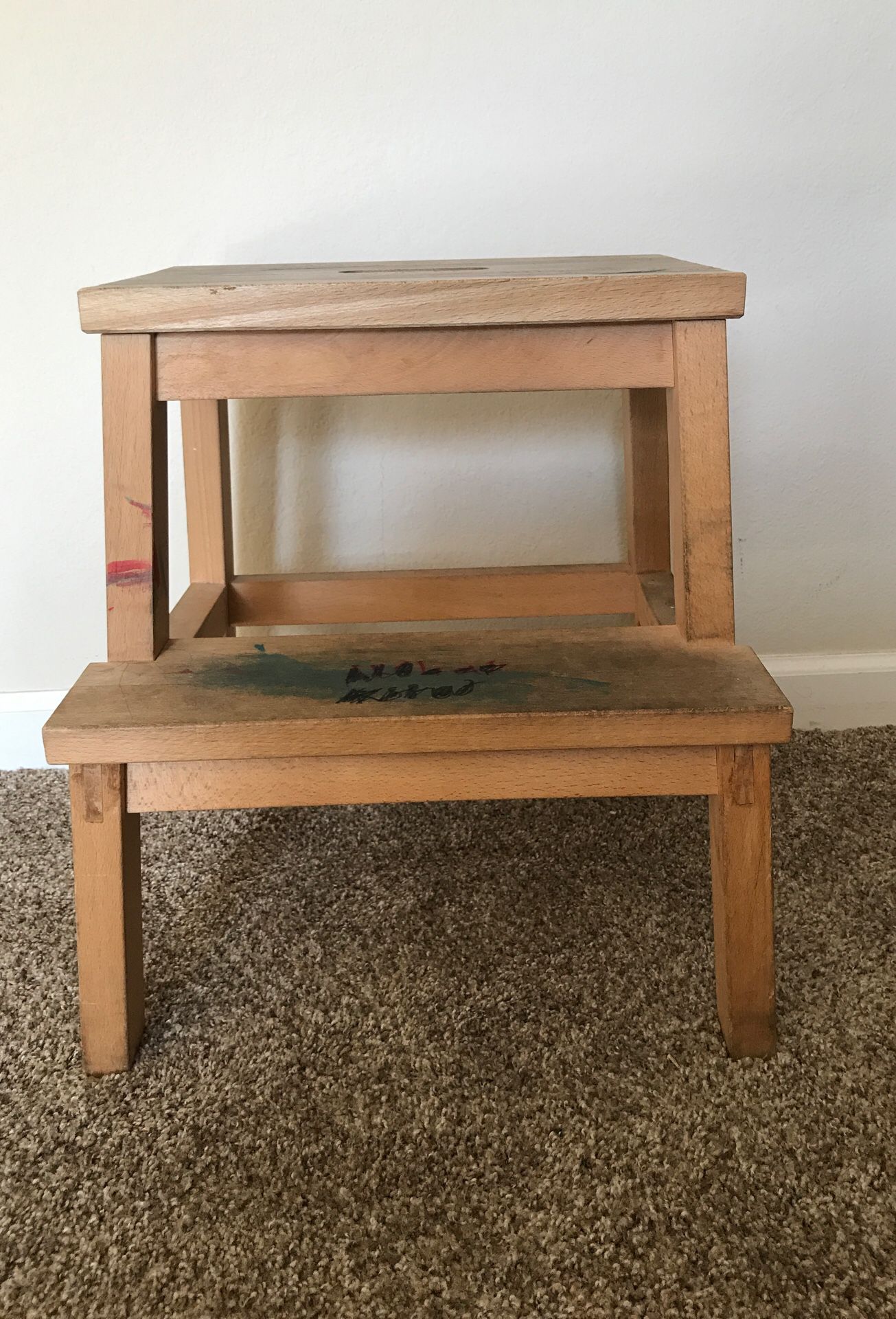 Solid wooden step stool.