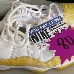 Nike Jordan 11 Low Retro Snakeskin shoes (yellow)