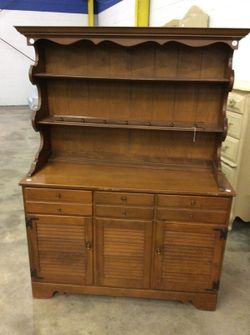 Ethan Allen solid wood dresser with two shelves two cupboards and three drawers