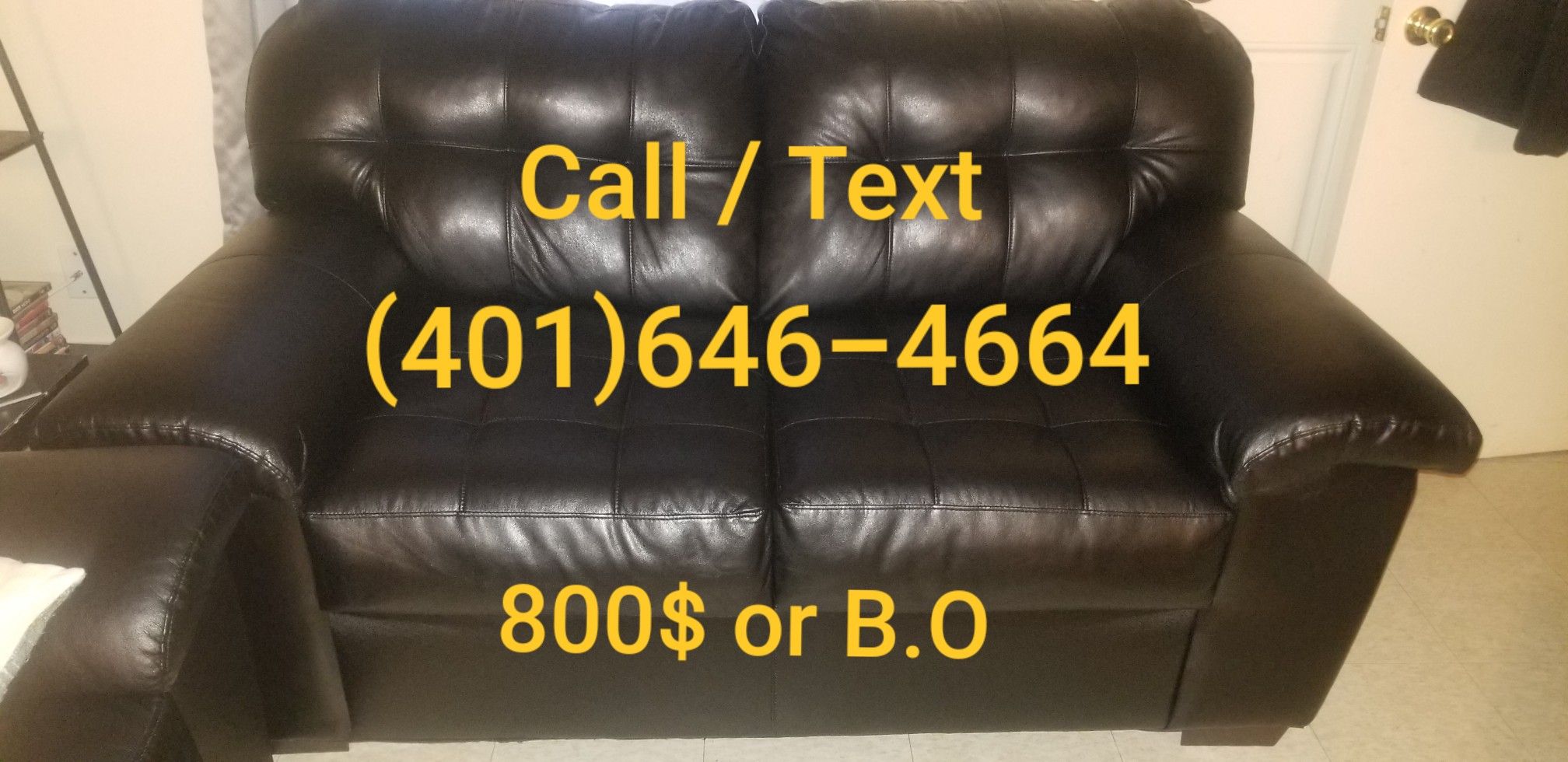 BLACK LEATHER SOFA AND LOVE SEAT