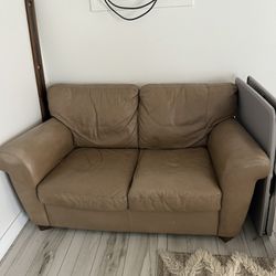 Well Loved Loveseat Couch 
