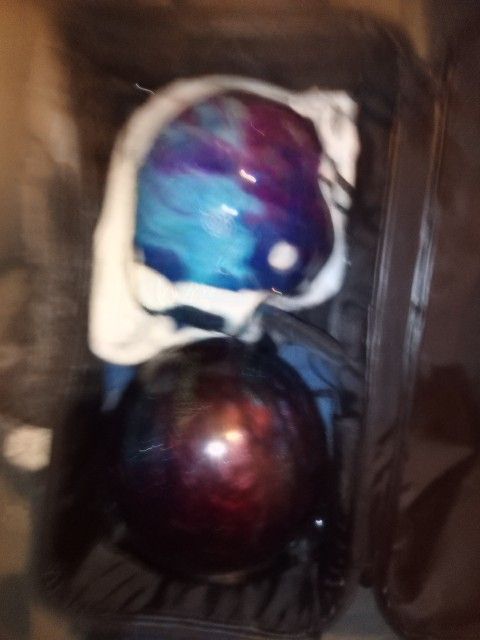 Two Bowling Balls With Case On Rollers