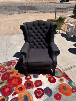 Black studded highback chairs 2;chairs