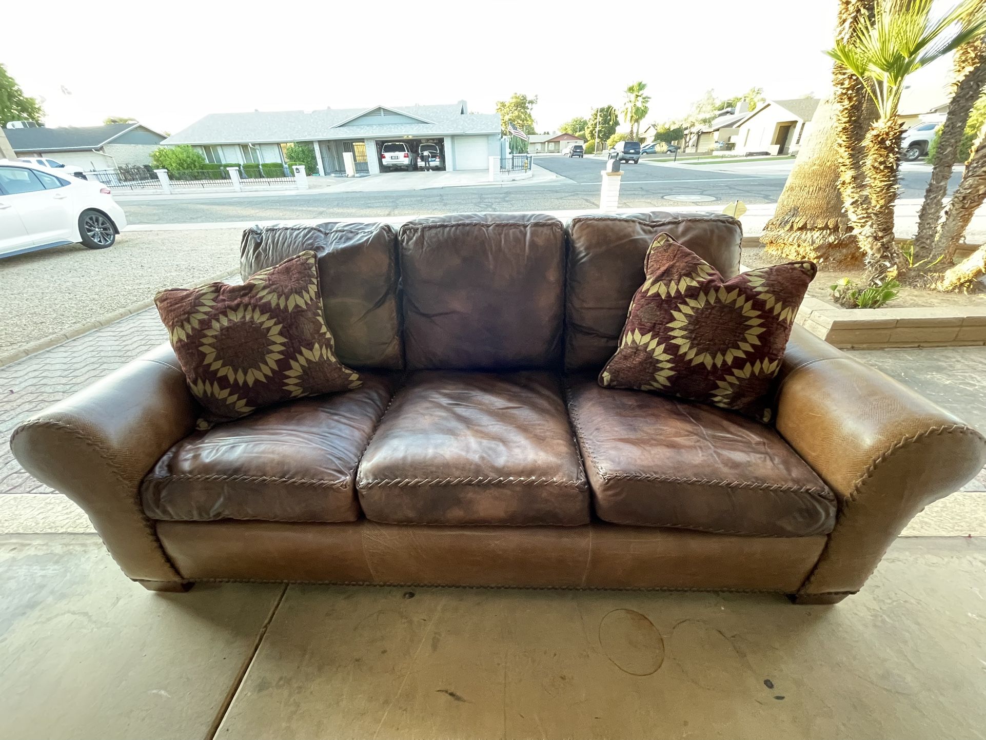 Alexander Sinclair, down-filled high-end leather couch