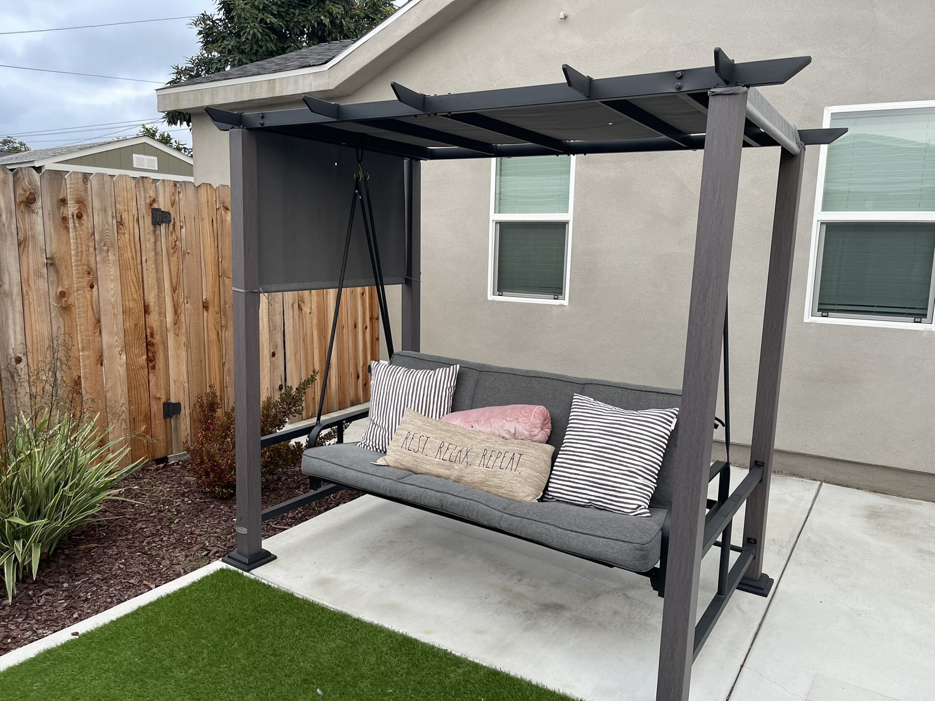 Rock and lounge in the breeze on daybed swing from Broyhill