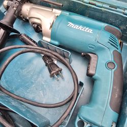 Makita 6.6 Amp 1/2 in. Corded Variable Speed Hammer Drill with Torque Limiter Side Handle Depth Gauge Chuck Hard Case