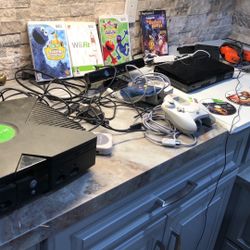 Large Amount of Video Game Console (wii & XBox)controllers,games and more.