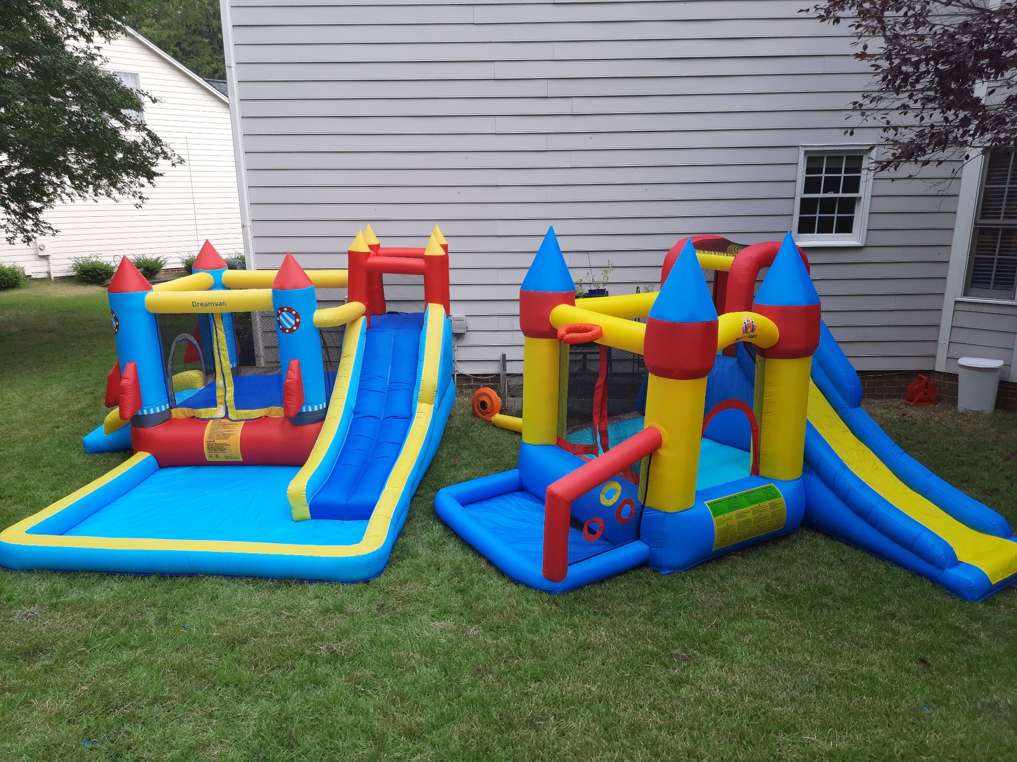 Inflatable Bounce Houses with Slides ($150 each)