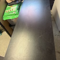 Long black craft table or kitchen table
