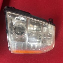 Driverside Headlight Came Off A 07 Cadillac Escalade 
