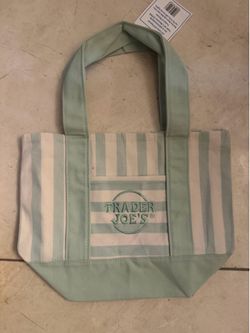 Trader Joe’s Embroidered Mint green Striped Mini Tote . Condition is New with tags