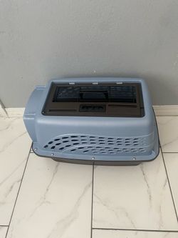 Small dog, portable cage