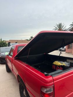 Fiberglass truck bed cover