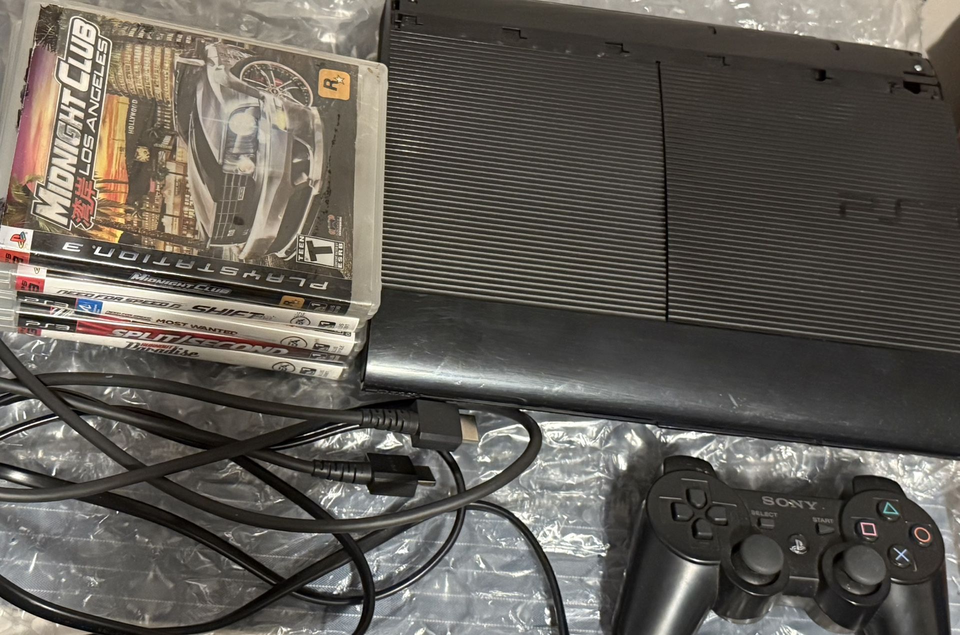 🎮 PlayStation 3 Slim Bundle – 5 Disc Games + 2 Digital Games!