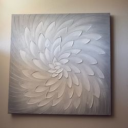 Gray and white artwork on canvas