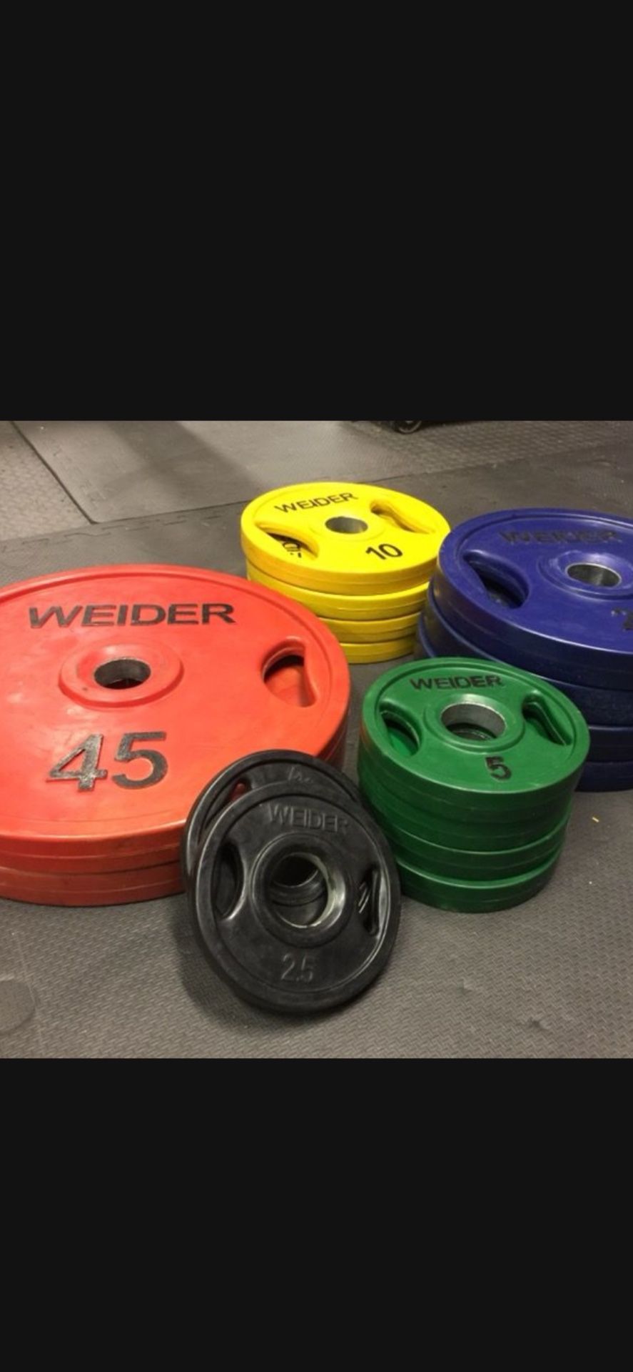 Like New Set Of 255 Lbs Rubber Coated Olympic Set