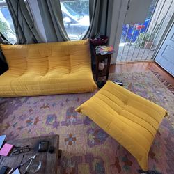 Orange/Yellow Boneless Couch And Ottoman