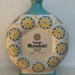 (4)Empty tequila mandala bottles