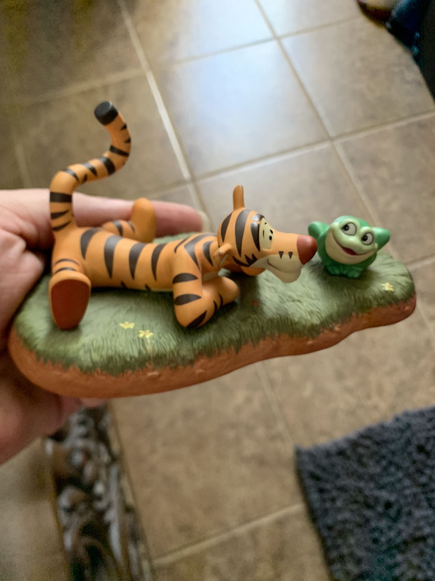 Two Disney Tigger figurines