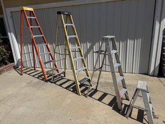 4 step ladders 300 lbs rated 8’ Sunset Fiberglass 7’ Husky’ 5’ Aluminum with tool shelf 3’ no cracks good condition $200 cash in Upland 91784