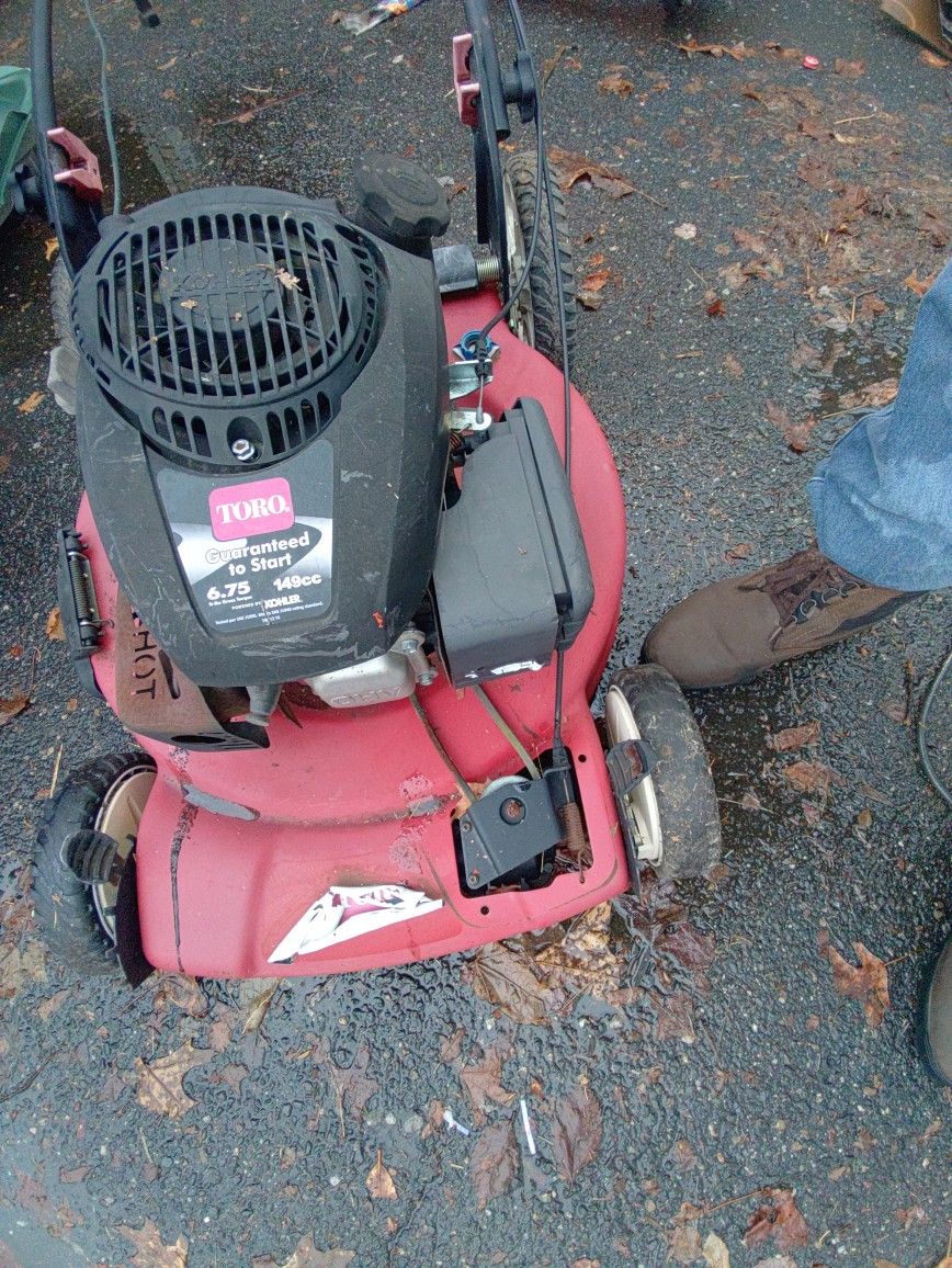 2 Mowers. As Is