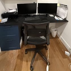 PRICED TO SELL. SLEEK DESK WITH CABINET