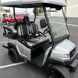 2024 BINTELLI BEYOND 4-PASSENGER NON-LIFTED 48-VOLT LITHIUM STREET LEGAL LSV IN METALLIC TITANIUM SILVER W/SILVER & BLACK SEATS
