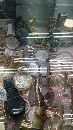 Original Michael Kors Mens Wacth & Women Wacth with papers & box life time warranty any wacth $150 each