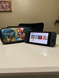 Nintendo Switch + Case  HANDHELD ONLY