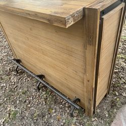 Bar with storage and 2 metal chairs