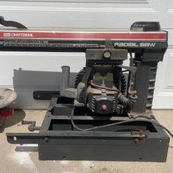 Craftsman 12-inch radial arm saw, a versatile woodworking tool. 