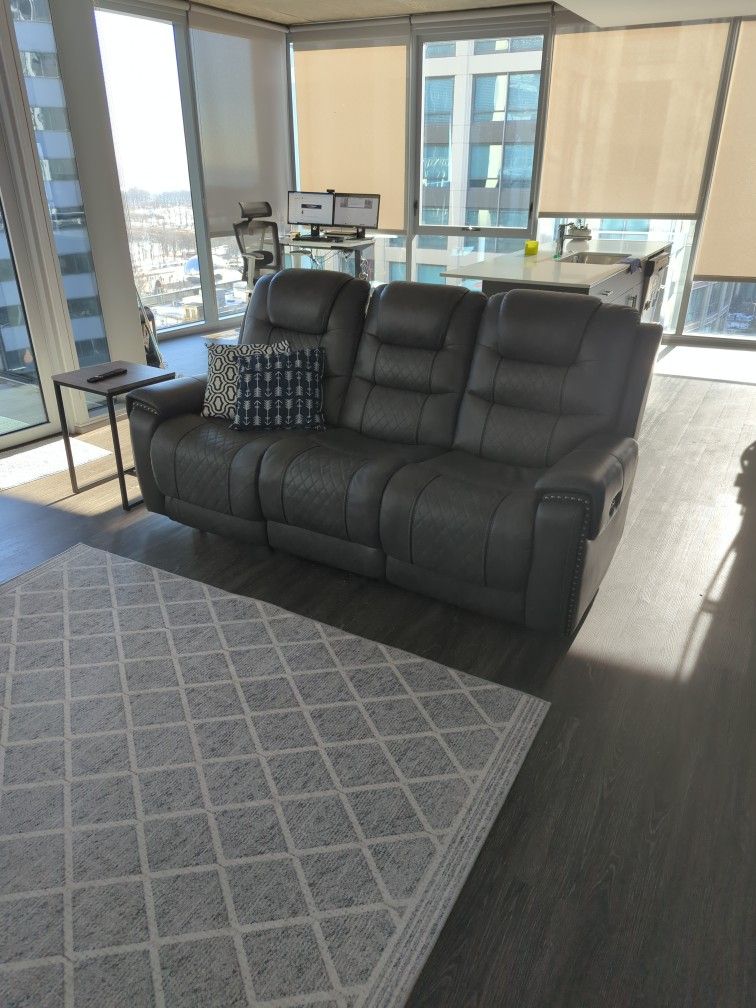 Magnus Charcoal Power Reclining Faux Leather Sofa